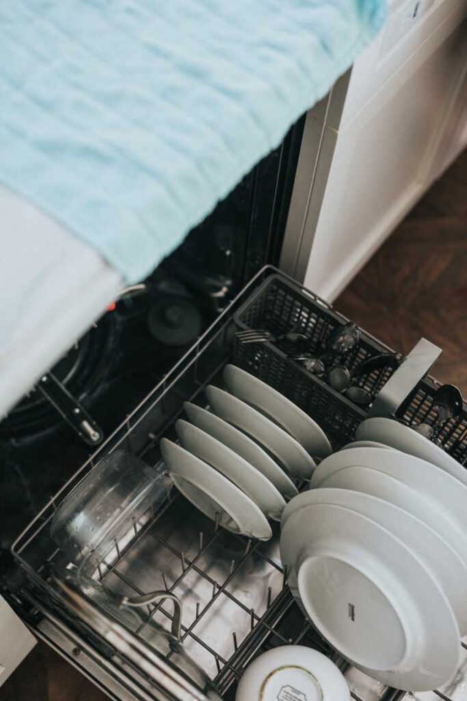 We wash dishes while cleaning your Airbnb rental